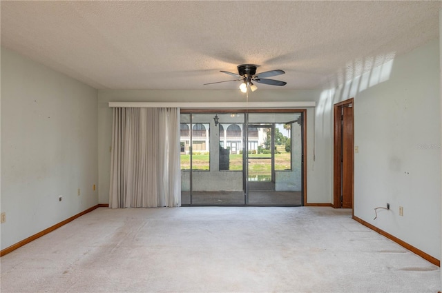 5102 Village Ct Unit E-2, Lake Wales, FL 33898 - carpeted spare room with ceiling fan, baseboards, and a textured ceiling