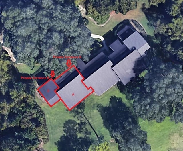 713 Olde Camelot Cir Unit 3303-4, Haines City, FL 33844 - aerial overview of property's location with property parcel outlined