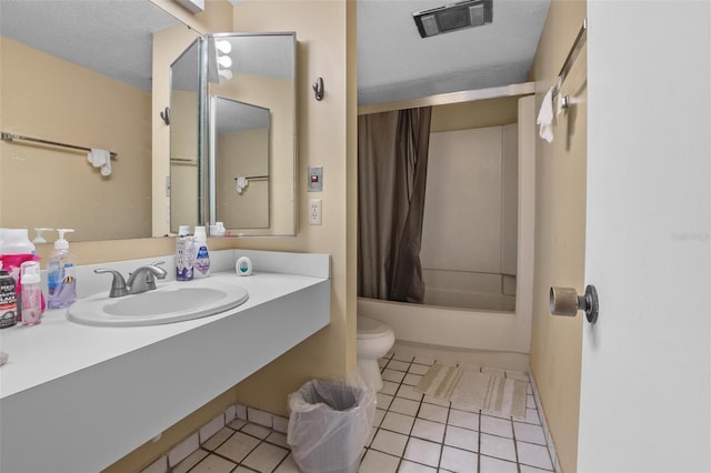 713 Olde Camelot Cir Unit 3303-4, Haines City, FL 33844 - full bathroom with toilet, tile patterned flooring, vanity, and shower / tub combo