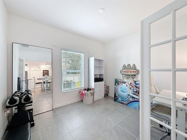 912 Scrub Oak Hammock Rd, Davenport, FL 33837 - interior space with light tile patterned floors and baseboards