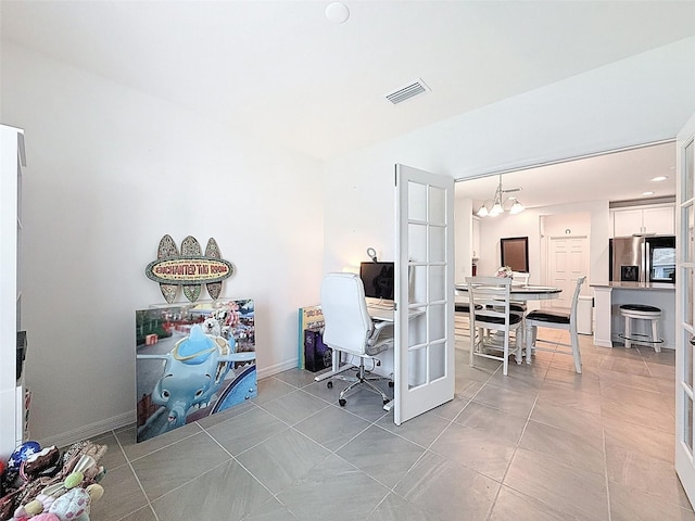 912 Scrub Oak Hammock Rd, Davenport, FL 33837 - office featuring a chandelier, light tile patterned flooring, and baseboards