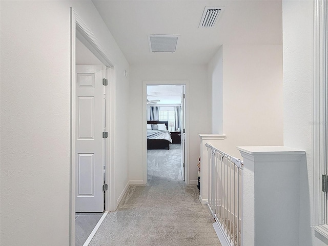 912 Scrub Oak Hammock Rd, Davenport, FL 33837 - corridor featuring light colored carpet and an upstairs landing