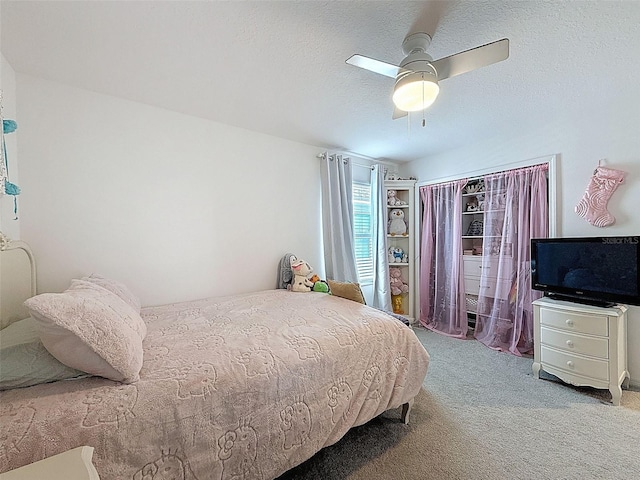 912 Scrub Oak Hammock Rd, Davenport, FL 33837 - bedroom with carpet floors and a ceiling fan