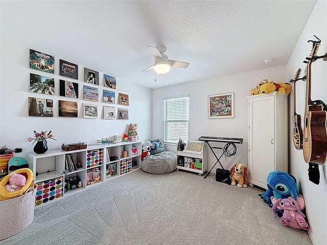 912 Scrub Oak Hammock Rd, Davenport, FL 33837 - playroom with carpet floors, ceiling fan, and a textured ceiling