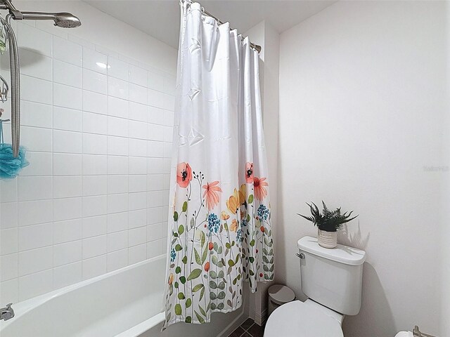 912 Scrub Oak Hammock Rd, Davenport, FL 33837 - bathroom featuring shower / bath combo and toilet
