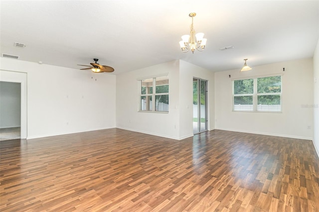 122 Port Royal Ct, Sebastian, FL 32958 - unfurnished room with wood finished floors, a chandelier, a ceiling fan, and baseboards