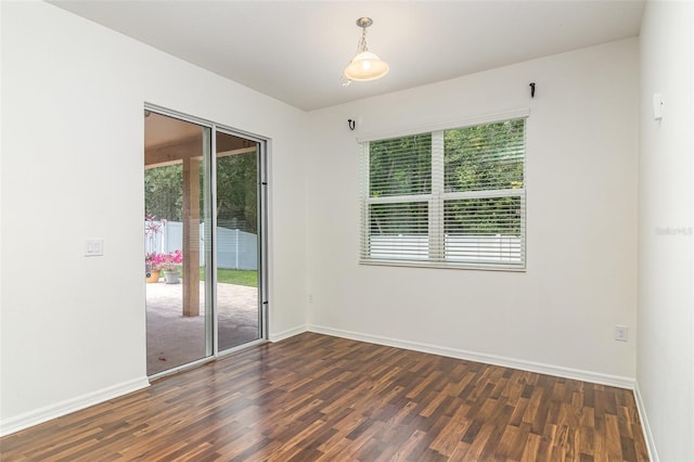 122 Port Royal Ct, Sebastian, FL 32958 - empty room featuring dark wood-style flooring and baseboards