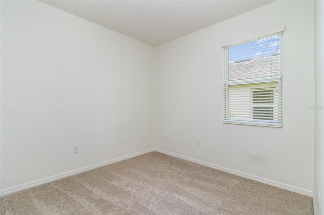 122 Port Royal Ct, Sebastian, FL 32958 - carpeted spare room with baseboards