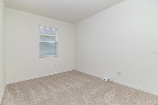 122 Port Royal Ct, Sebastian, FL 32958 - spare room with carpet floors and baseboards