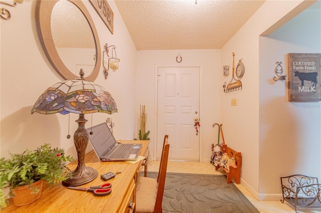 40 Westridge Rd, Davenport, FL 33837 - entrance foyer with a textured ceiling and baseboards