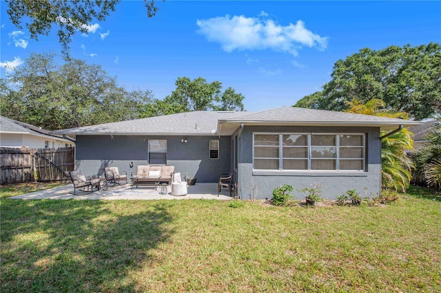 40 Westridge Rd, Davenport, FL 33837 - rear view of property with an outdoor hangout area, stucco siding, and a patio