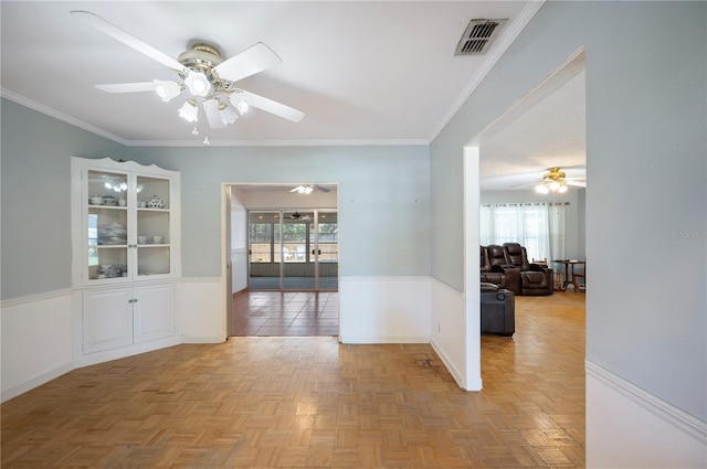 961 Oleander Dr SE, Winter Haven, FL 33880 - unfurnished room with a ceiling fan, ornamental molding, and baseboards