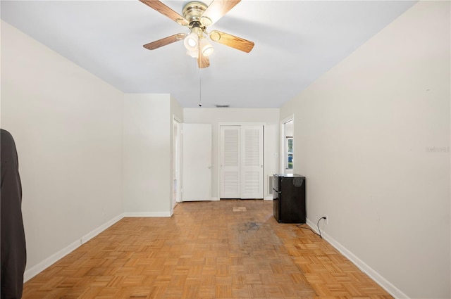 961 Oleander Dr SE, Winter Haven, FL 33880 - spare room featuring baseboards and ceiling fan