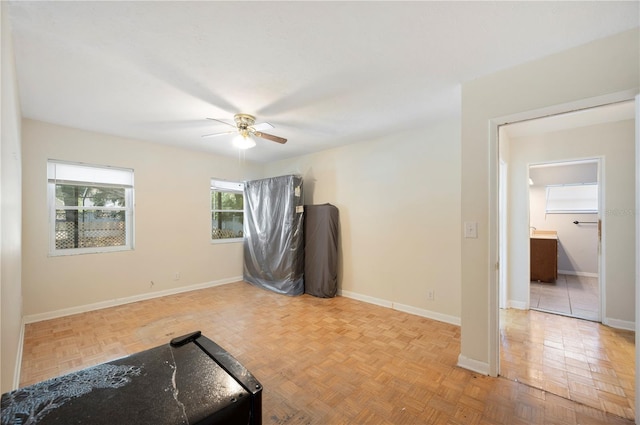 961 Oleander Dr SE, Winter Haven, FL 33880 - unfurnished room with a ceiling fan and baseboards