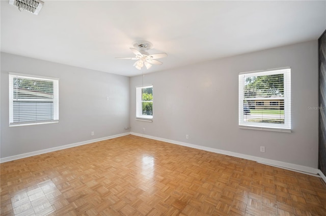 961 Oleander Dr SE, Winter Haven, FL 33880 - empty room featuring baseboards and a ceiling fan