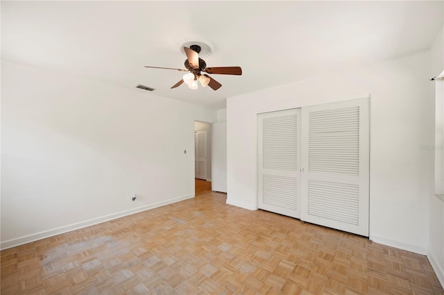 961 Oleander Dr SE, Winter Haven, FL 33880 - unfurnished bedroom with baseboards, a closet, and ceiling fan