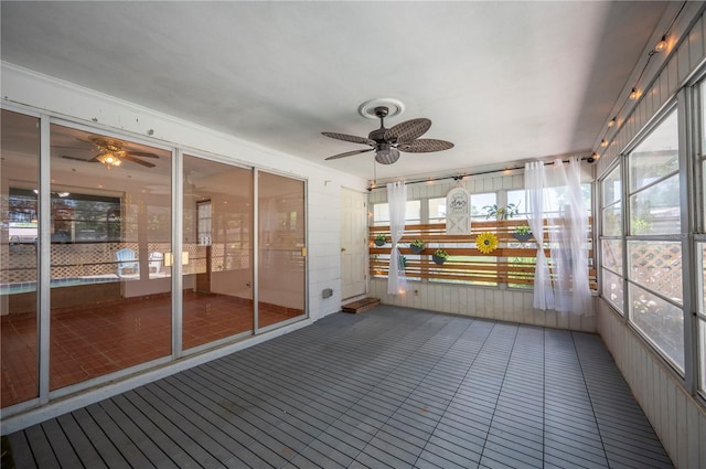 961 Oleander Dr SE, Winter Haven, FL 33880 - unfurnished sunroom with ceiling fan and plenty of natural light