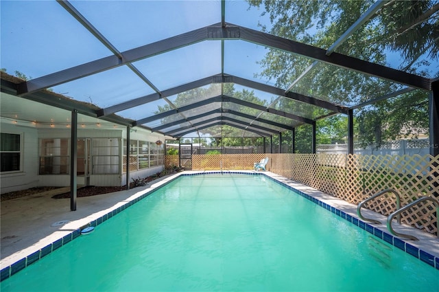 961 Oleander Dr SE, Winter Haven, FL 33880 - view of swimming pool featuring a patio and a lanai