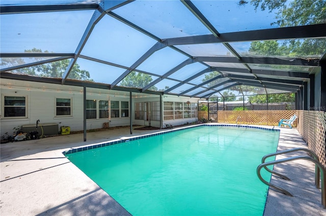 961 Oleander Dr SE, Winter Haven, FL 33880 - view of swimming pool featuring a patio area and a lanai