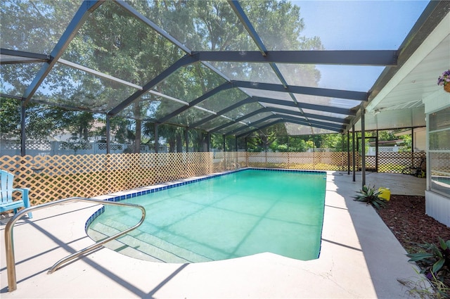 961 Oleander Dr SE, Winter Haven, FL 33880 - view of swimming pool with a patio area and glass enclosure