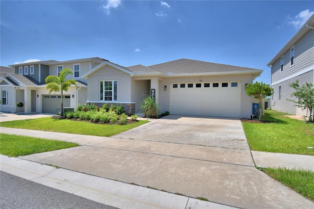 1100 Sugarwood St, Davenport, FL 33837 - view of front of house featuring a garage, stucco siding, driveway, and a front lawn