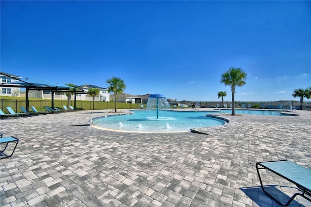 1100 Sugarwood St, Davenport, FL 33837 - community pool featuring a patio area