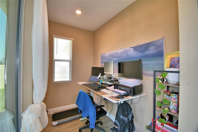 1100 Sugarwood St, Davenport, FL 33837 - office area featuring wood finish floors and baseboards