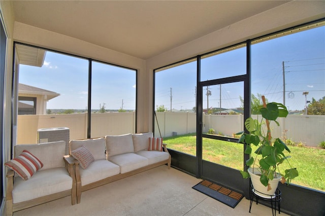 1100 Sugarwood St, Davenport, FL 33837 - sunroom featuring healthy amount of natural light and outdoor lounge area