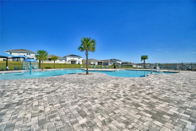 1100 Sugarwood St, Davenport, FL 33837 - community pool featuring a patio