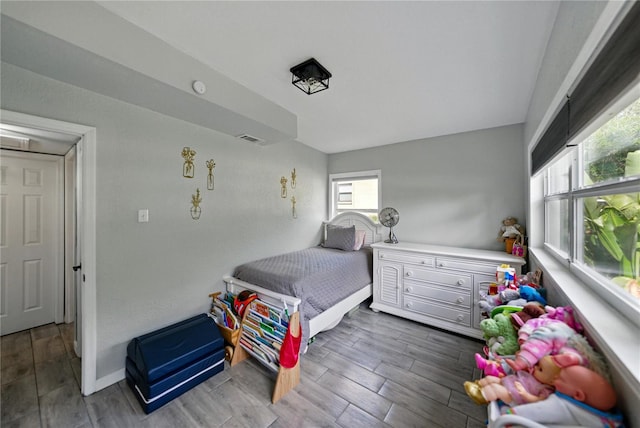 1140 W Seminole Trl, Bartow, FL 33830 - bedroom featuring wood finished floors and baseboards