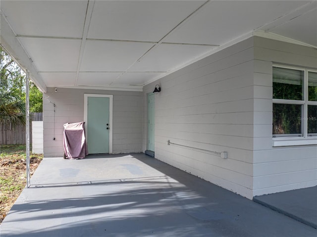 1140 W Seminole Trl, Bartow, FL 33830 - doorway to property with a carport and a patio area