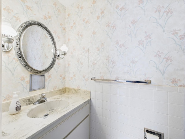 2700 Bayshore Blvd Unit 3210, Dunedin, FL 34698 - bathroom featuring wallpapered walls and vanity