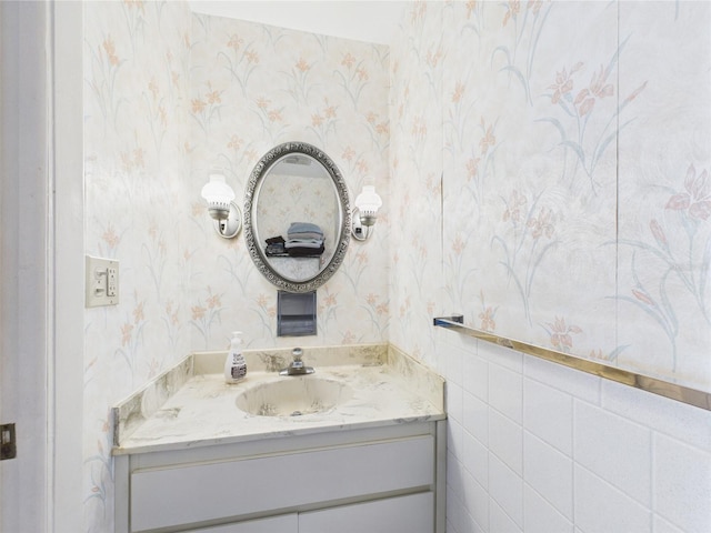 2700 Bayshore Blvd Unit 3210, Dunedin, FL 34698 - bathroom with wallpapered walls and vanity