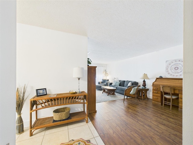 2700 Bayshore Blvd Unit 3210, Dunedin, FL 34698 - living room featuring wood finished floors and a textured ceiling