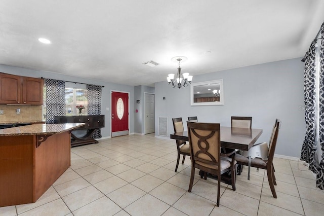 320 Boger Blvd S, Lakeland, FL 33803 - dining room featuring a chandelier, light tile patterned floors, baseboards, and recessed lighting