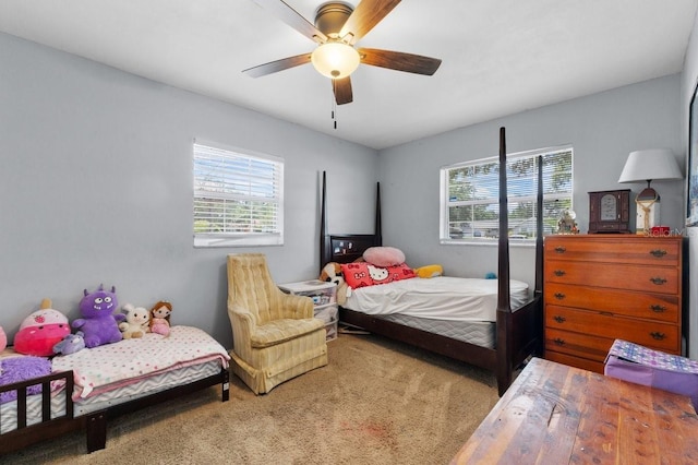 320 Boger Blvd S, Lakeland, FL 33803 - bedroom featuring multiple windows, ceiling fan, and carpet floors