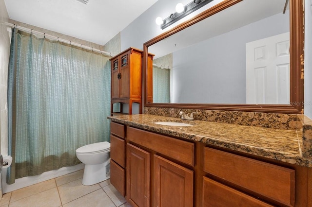 320 Boger Blvd S, Lakeland, FL 33803 - bathroom featuring toilet, tile patterned floors, and vanity