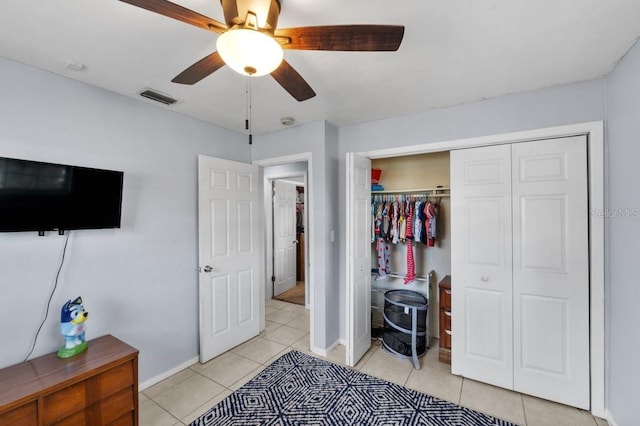 320 Boger Blvd S, Lakeland, FL 33803 - bedroom featuring light tile patterned floors, a closet, ceiling fan, and baseboards