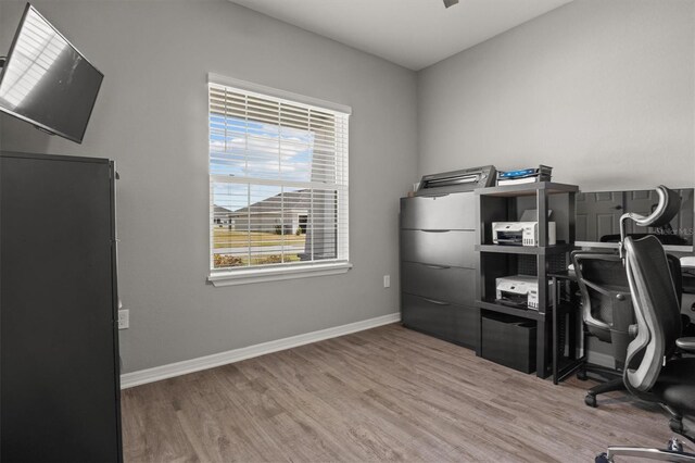 1081 Sandpiper Loop, Winter Haven, FL 33881 - office area featuring wood finished floors and baseboards