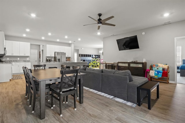 1081 Sandpiper Loop, Winter Haven, FL 33881 - dining area featuring ceiling fan, light wood-type flooring, and recessed lighting
