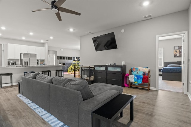 1081 Sandpiper Loop, Winter Haven, FL 33881 - living area with a ceiling fan, light wood-style floors, recessed lighting, and baseboards
