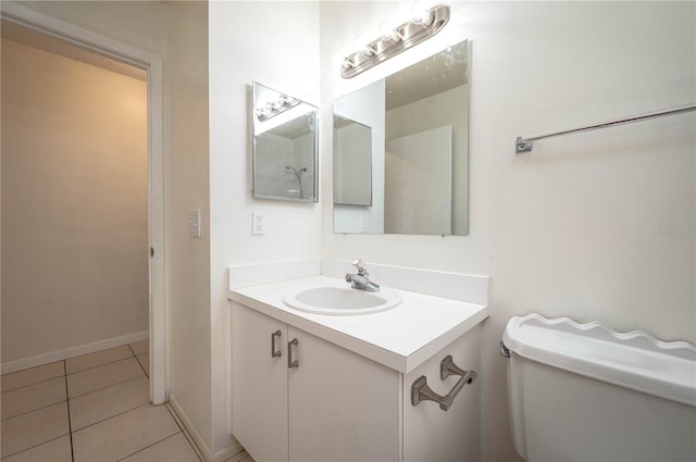 299 Winter Ridge Blvd Unit 299, Winter Haven, FL 33881 - bathroom featuring toilet, vanity, and tile patterned flooring