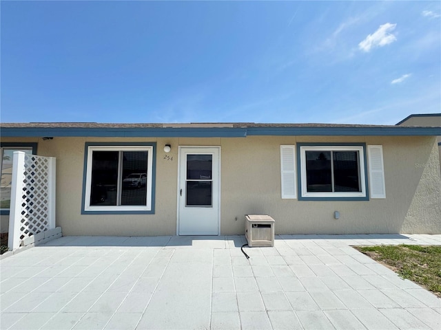 254 Winter Ridge Blvd Unit 254, Winter Haven, FL 33881 - back of property with a patio area