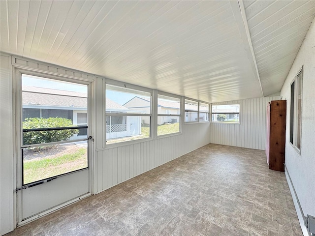 254 Winter Ridge Blvd Unit 254, Winter Haven, FL 33881 - unfurnished sunroom featuring brick patterned floors