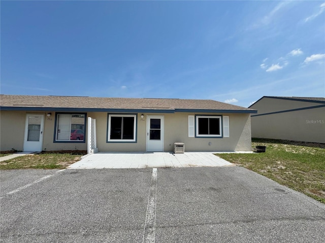 254 Winter Ridge Blvd Unit 254, Winter Haven, FL 33881 - view of front of home with stucco siding