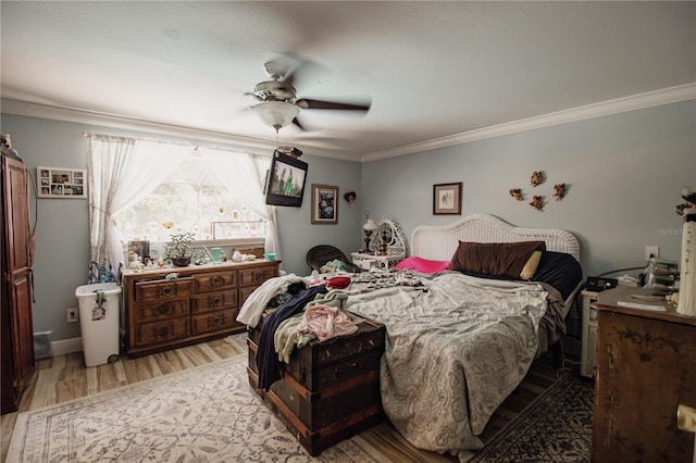 2213 W Pilaklakaha Ave, Auburndale, FL 33823 - bedroom with wood finished floors, ornamental molding, and ceiling fan