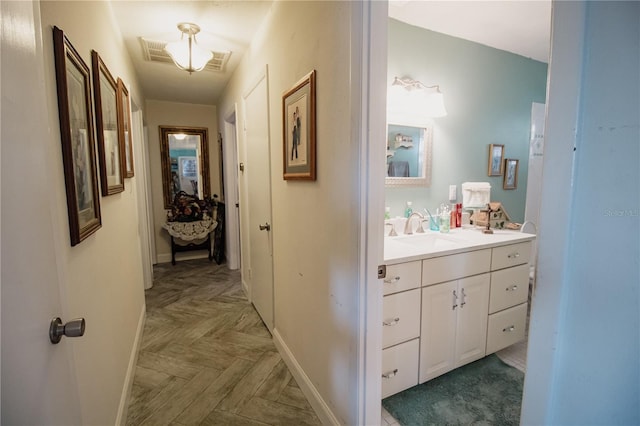 2213 W Pilaklakaha Ave, Auburndale, FL 33823 - hallway with a sink and baseboards