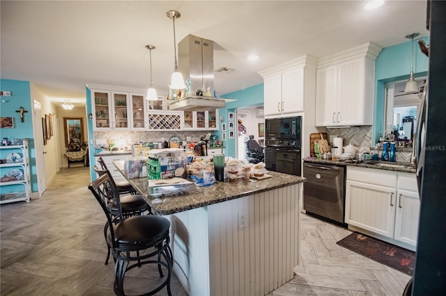 2213 W Pilaklakaha Ave, Auburndale, FL 33823 - kitchen featuring dishwashing machine, black microwave, tasteful backsplash, dark stone countertops, and recessed lighting