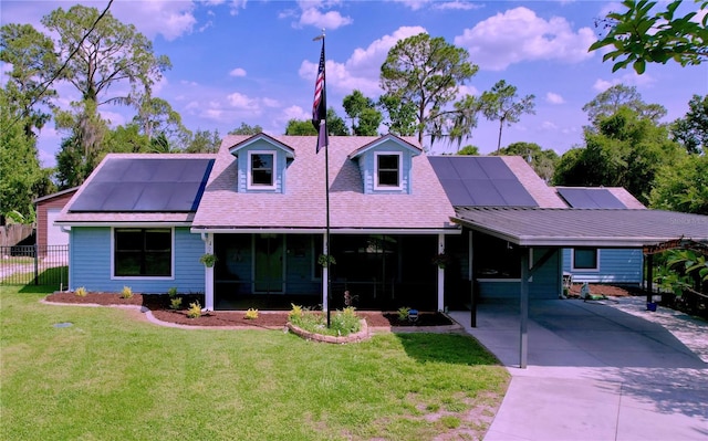 3705 Pine Cir, Lake Wales, FL 33898 - cape cod home featuring roof mounted solar panels and driveway