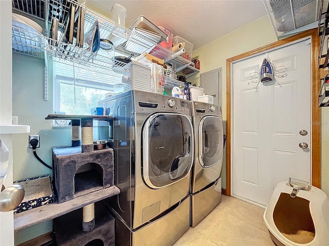 3705 Pine Cir, Lake Wales, FL 33898 - laundry room featuring separate washer and dryer and tile patterned floors